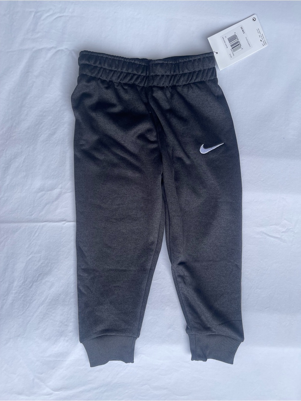 Nike Kids Black Jogger Sweatpants with White Swoosh